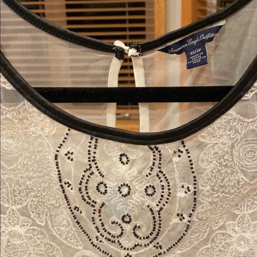 LACE PEPLUM TOP - Picture 2 of 4